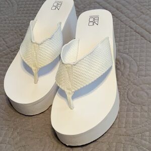 No boundaries platform wedge flip flop thong sandals.